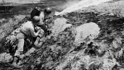 Marines use a flamethrower in April 1951